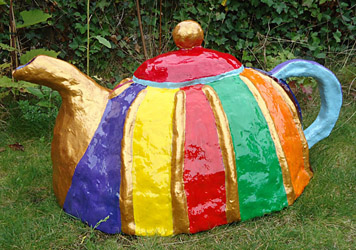 Fiberglass teapot for a giant in a playground