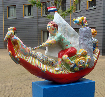 Sculpture A day on the water, polyester sculpture, a boat with family. father, mother, son, daughter and dog