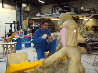 painting the polyester sculpture of the peat ship which will be placed in Stadskanaal