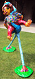 Polyester statue Ostrich Boy by Twan de Vos, boy riding an ostrich, to sit, he has his jersey on the neck of the ostrich done, garden statue